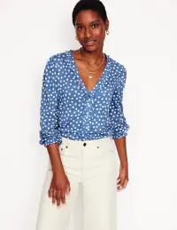 Poppy Ruffled Henley Top-Blue River. Abstract Spot